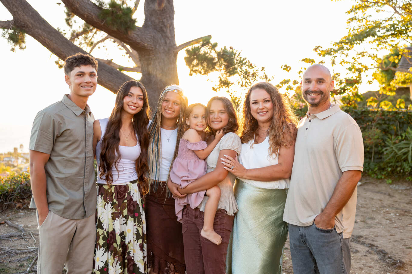 Family at golden hour in the backyard